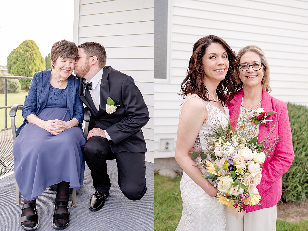 The groom kissing his mother on the cheek, and the bride standing with her mother.